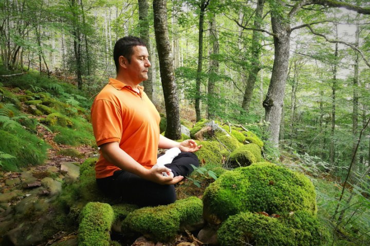 a person sitting in a garden