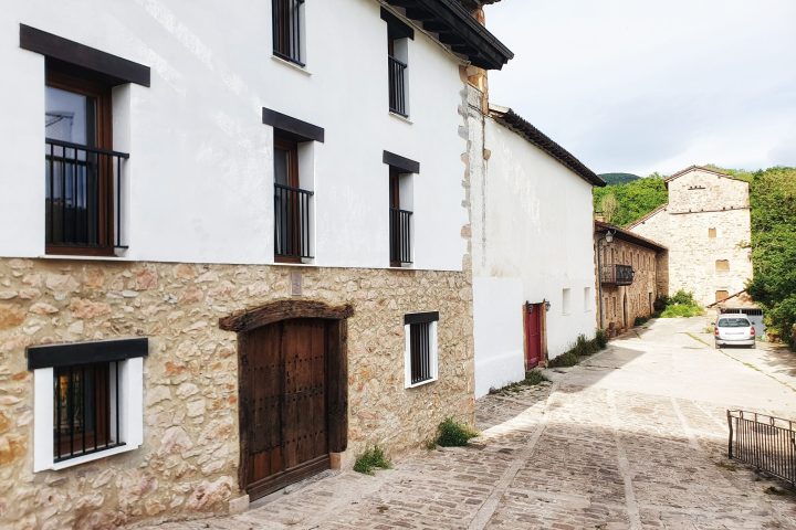 a house that is parked on the side of a building