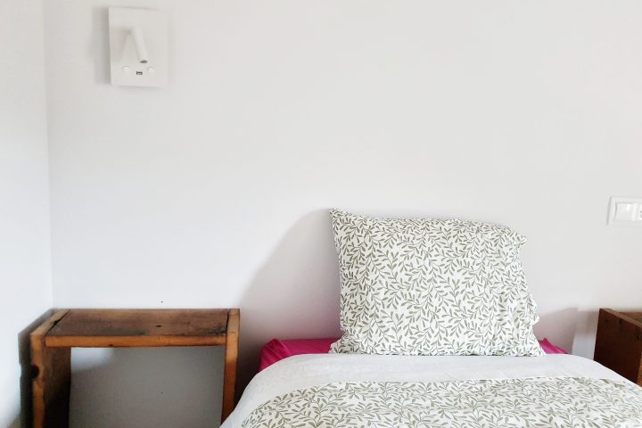 a large bed sitting in a room