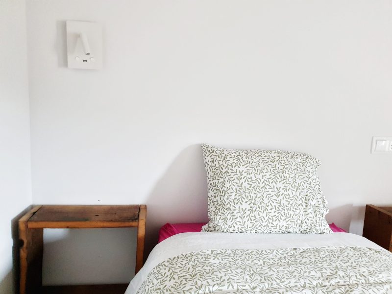 a large bed sitting in a room