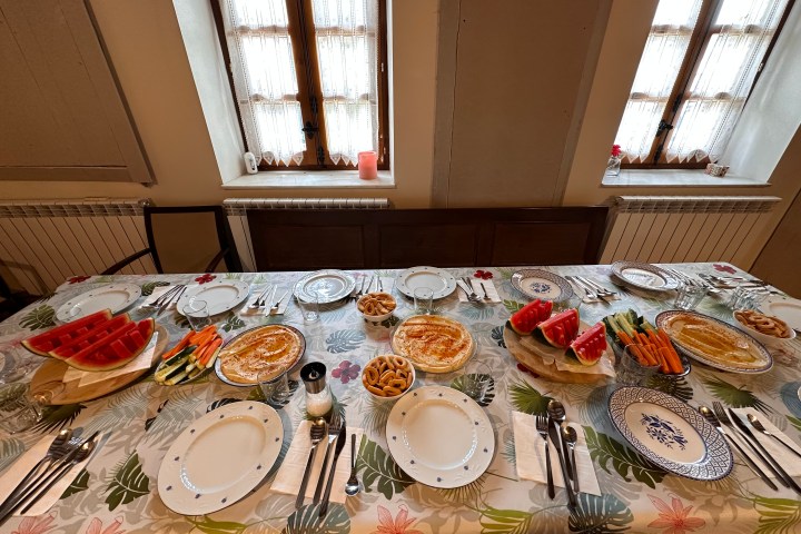 a table topped with plates of food on a plate