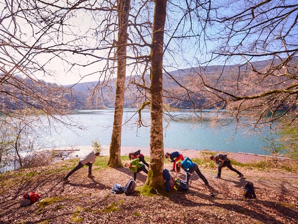 a group of people riding on the back of a park